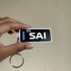 ca874e93-b234-4923-b8c2-58e8744e2d8c-72276-0000436130b3064c_file Sainz Race Tag Keychain